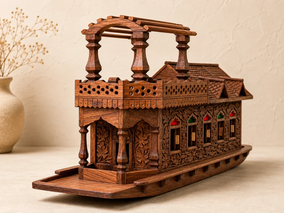 Hand-carved wooden houseboat model inspired by traditional Kashmiri architecture, featuring detailed latticework, carved panels, and decorative craftsmanship.